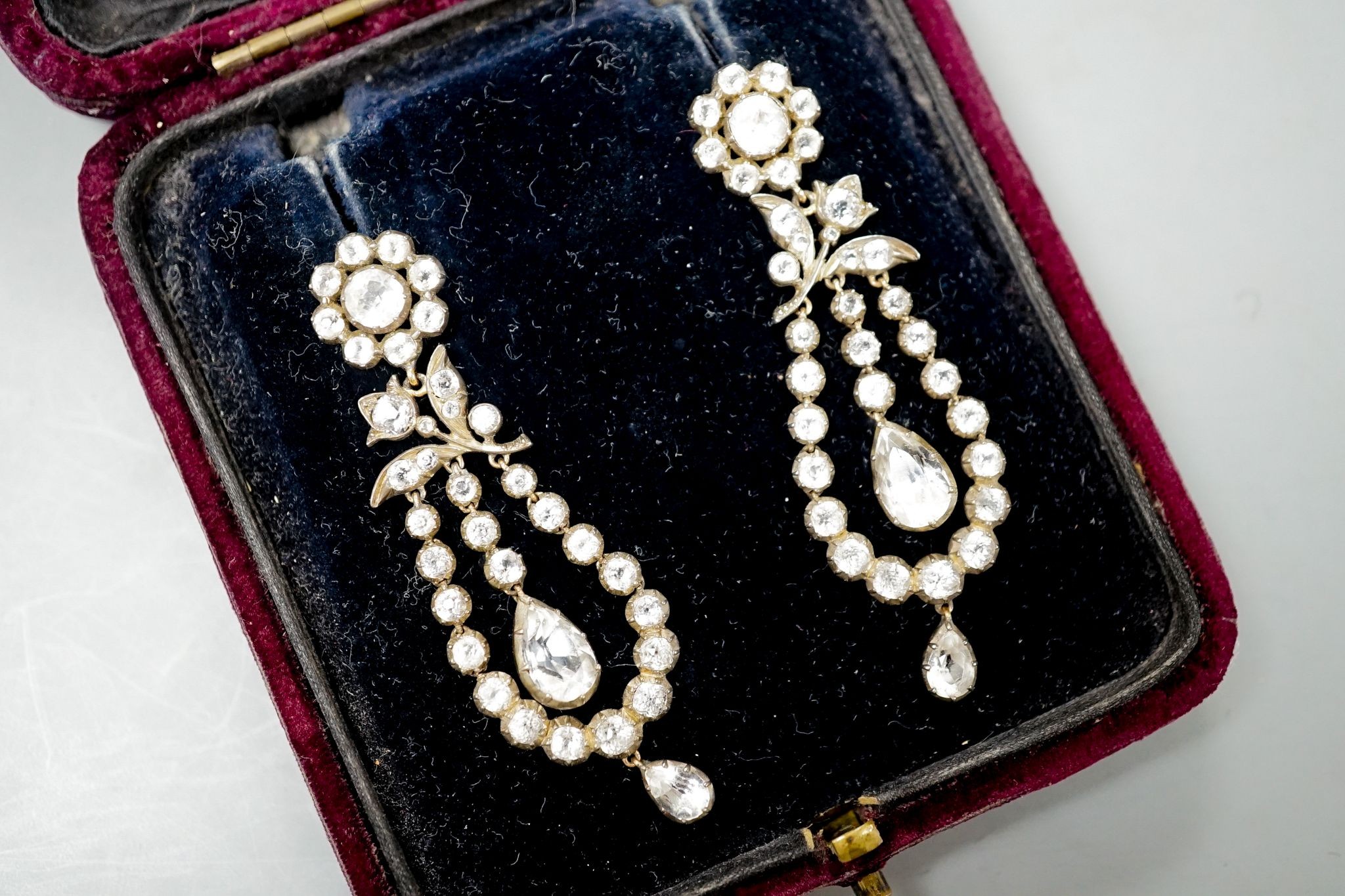 A pair of 19th century yellow and white metal mounted paste set drop earrings, 62mm.